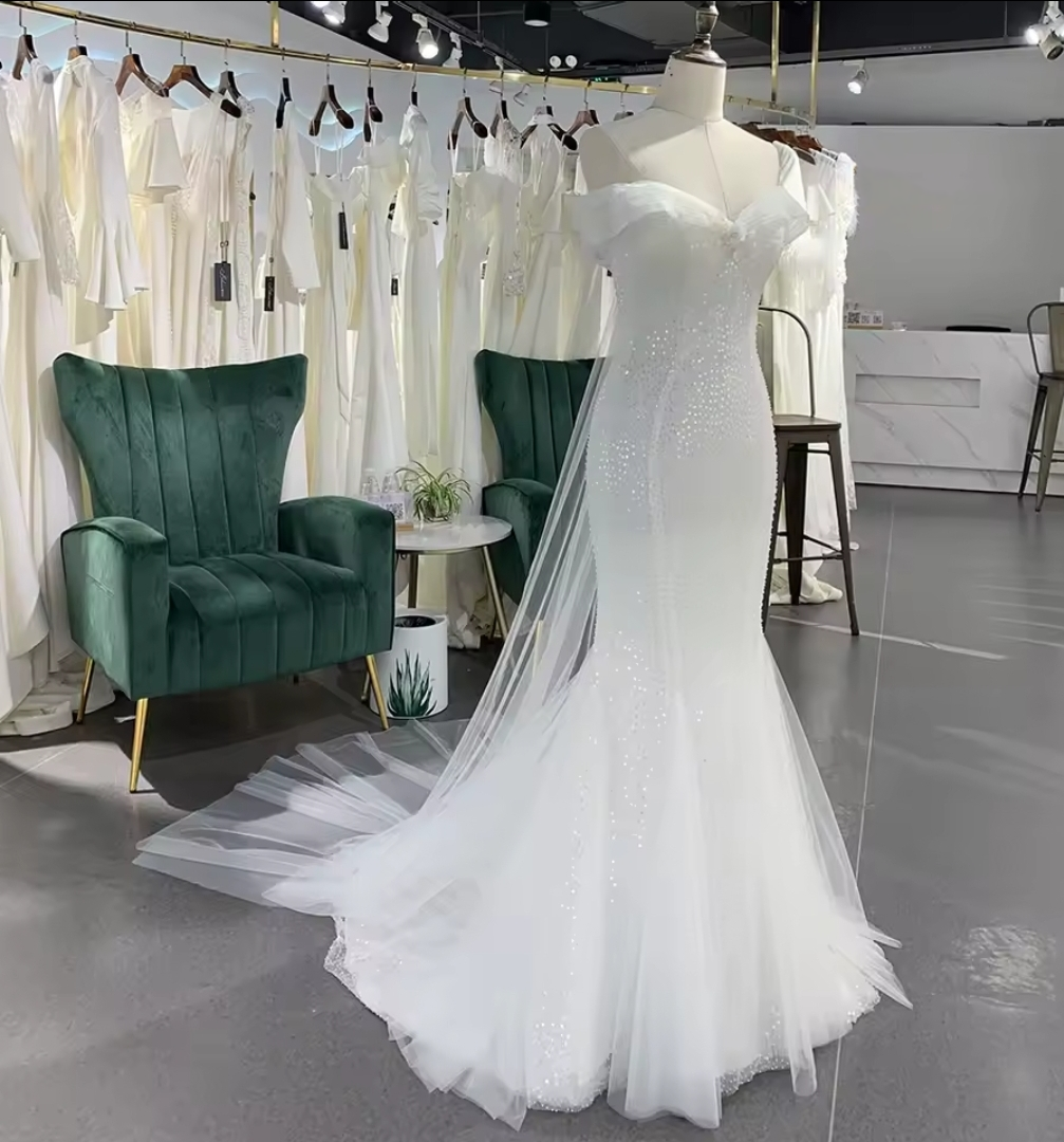 Pleated Off The Shoulder Sweetheart Sequinned Trumpet Bridal & Ceremonial Gown With Front Floral Beaded Embellishment And Back Train
