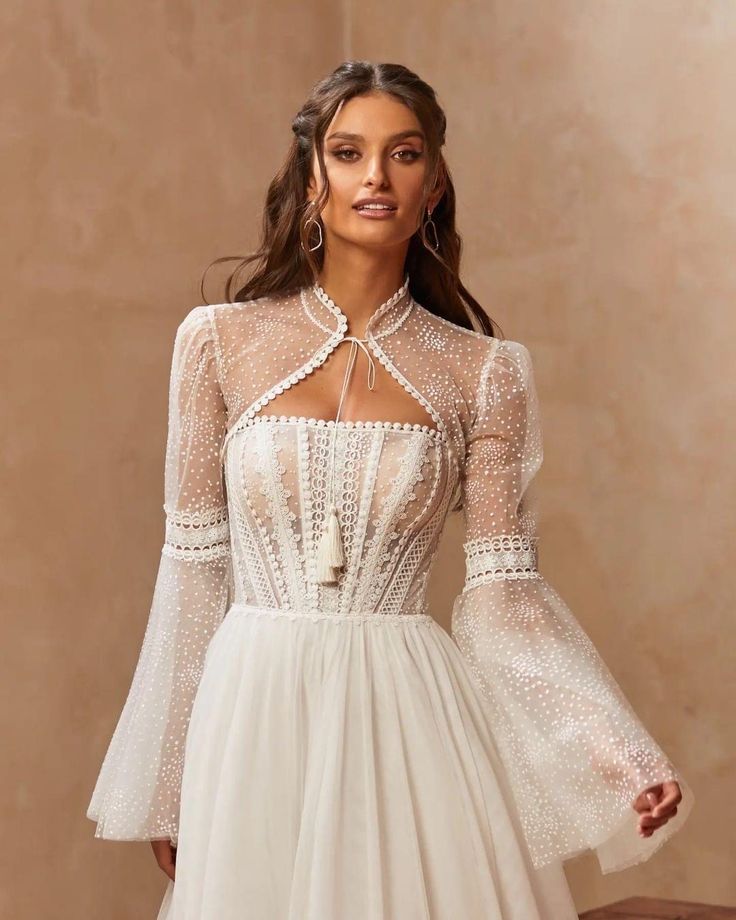 Boho Lace Dotted Strapless Boat Neck With Draped Tassel Detail A-Line Gown With Lace Up Closure And Matching Detached Flare Sleeve Bolero