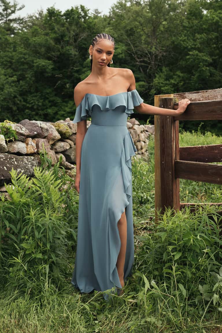 Classically Romantic Chiffon Flattering Off The Shoulder Neckline With A Dainty Ruffled Sleeve, And A Side Slit With A Delicately Cascading Ruffle Bridesmaid Dress