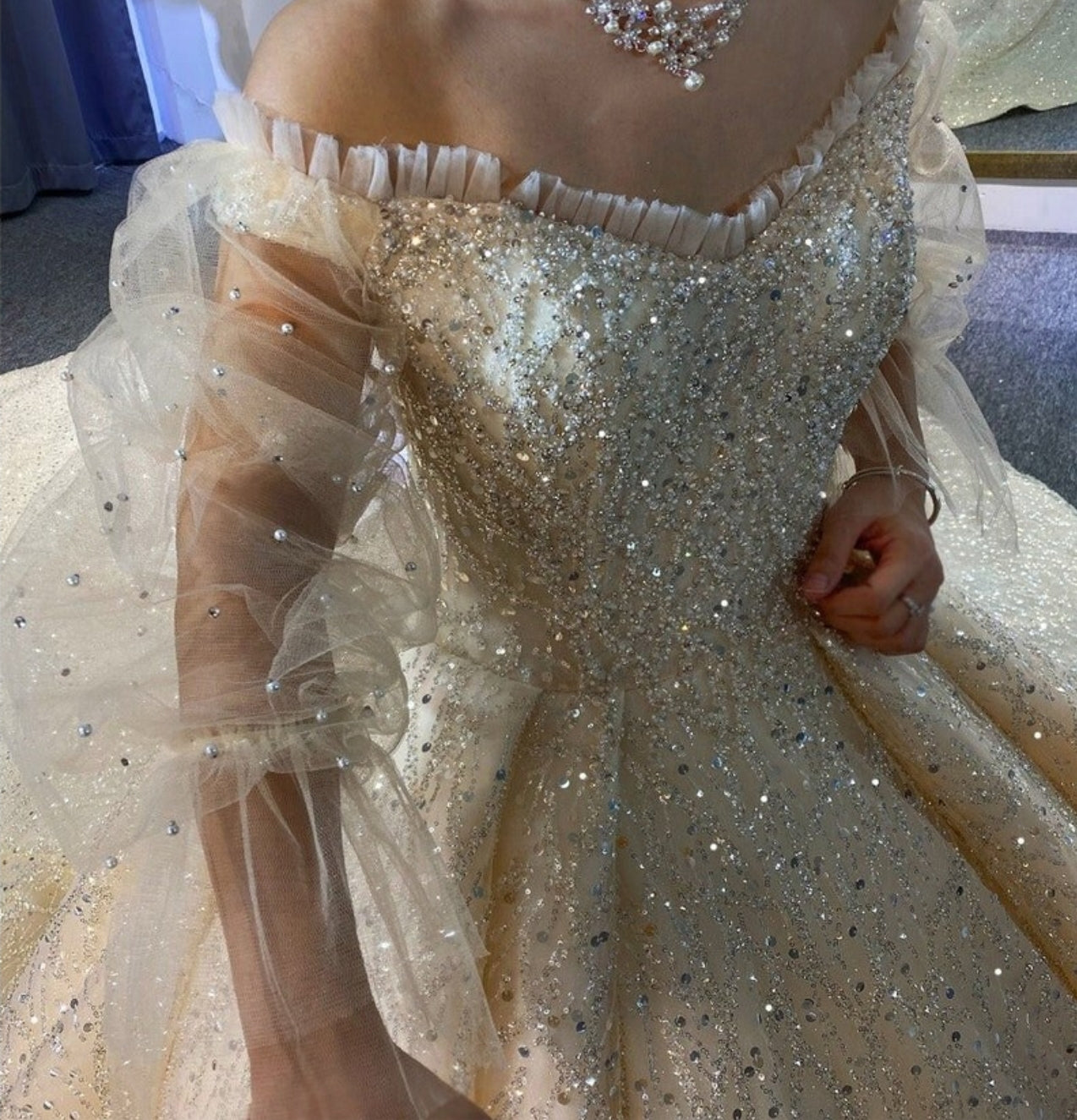 Shimmering Tulle Trimmed Sweetheart Sheer Full Sleeve Wedding Ball Gown