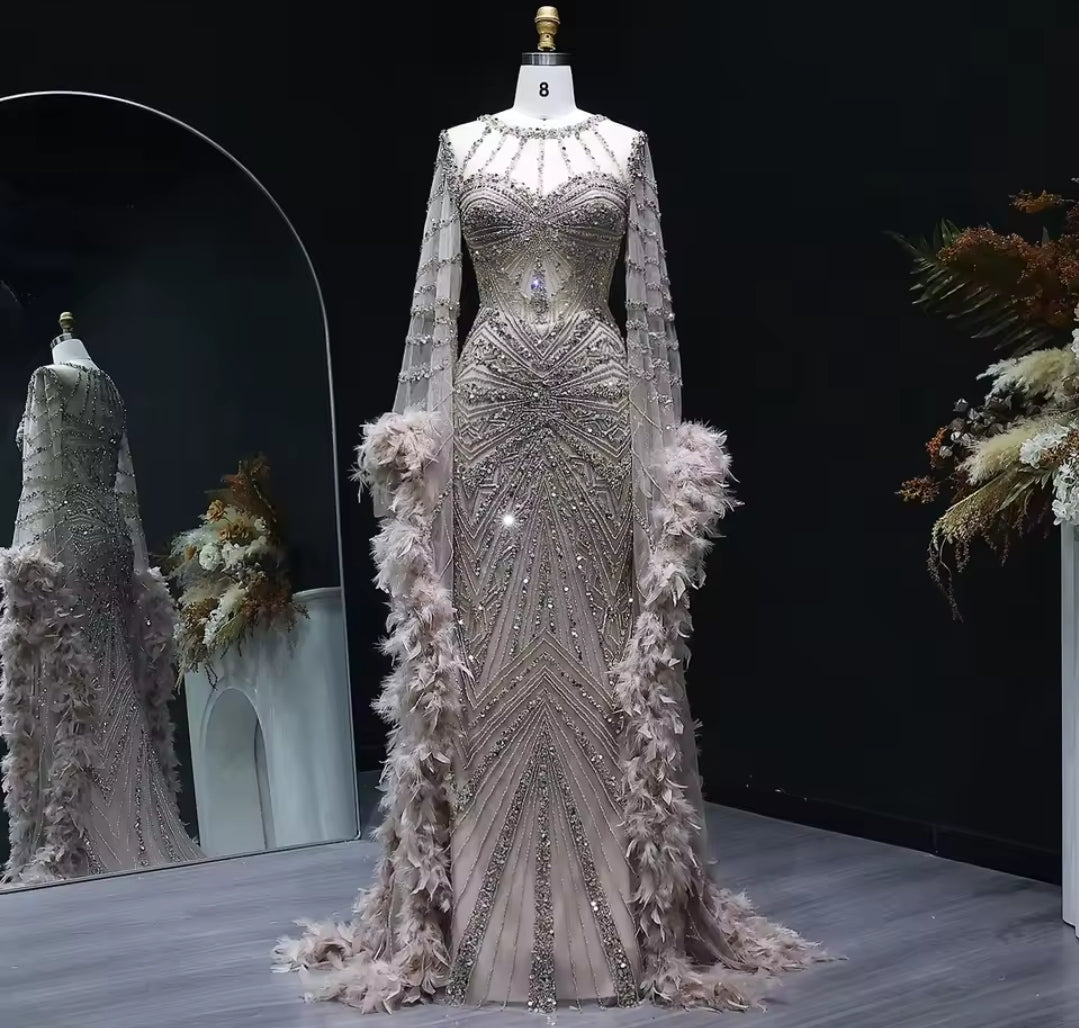 Stunning Multi Beaded Throughout Mermaid Special Occasion Gown With Feather Detail Long Sleeves