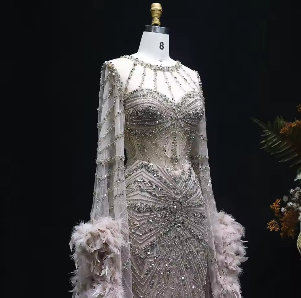 Stunning Multi Beaded Throughout Mermaid Special Occasion Gown With Feather Detail Long Sleeves