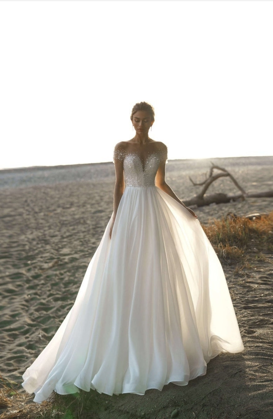 A Touch Of Sparkle Sweetheart Illusion Gown