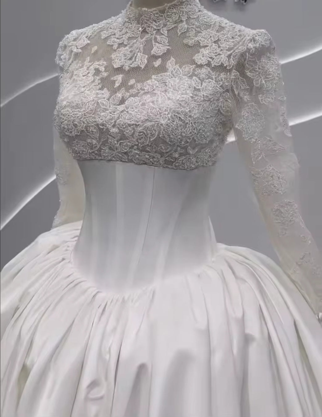 Long Sleeve Floral Lace Cinched Bodice A-Line Pleated Bridal Gown