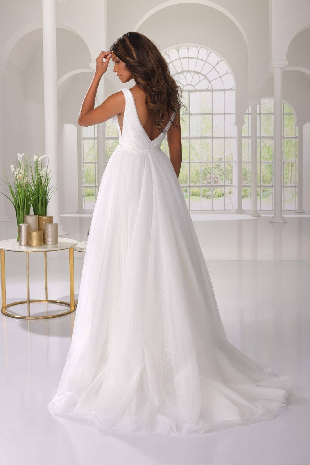 Sleeveless Pleated Minimalist Beautiful Flowing A-Line Ceremonial And Bridal Gown