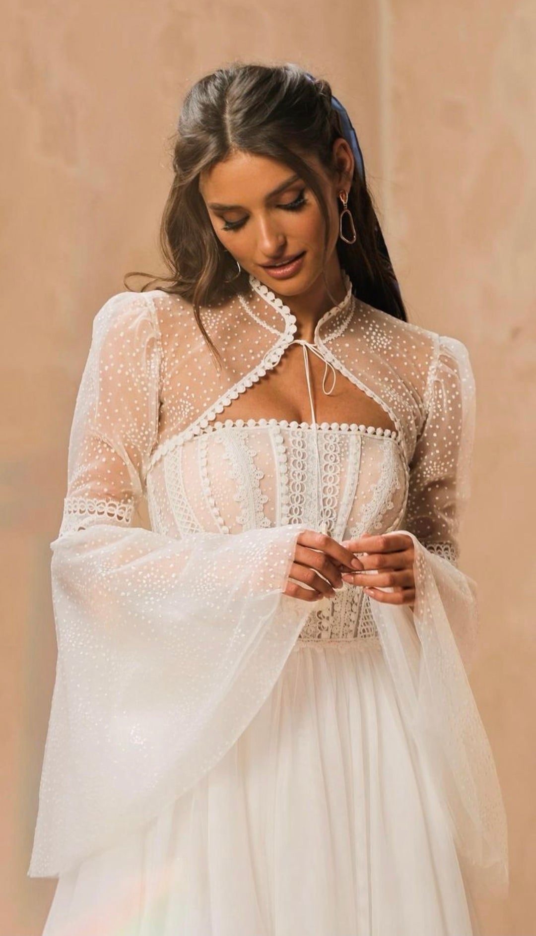 Boho Lace Dotted Strapless Boat Neck With Draped Tassel Detail A-Line Gown With Lace Up Closure And Matching Detached Flare Sleeve Bolero