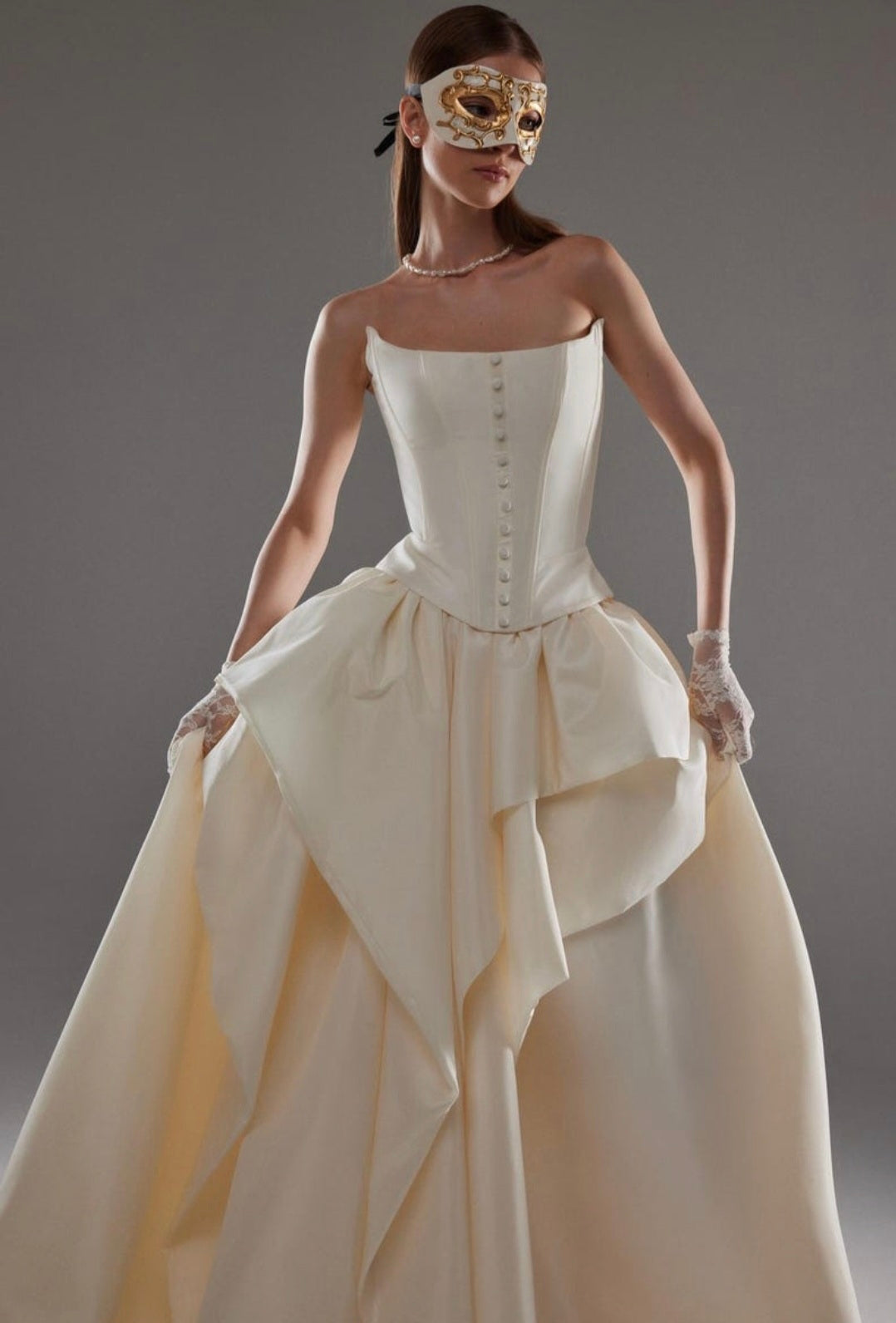 Cat Eye Boat Neck Strapless Front Multi Button Detail Corset Bridal And Ceremonial Gown With Multi Layered Skirt And Split Hem
