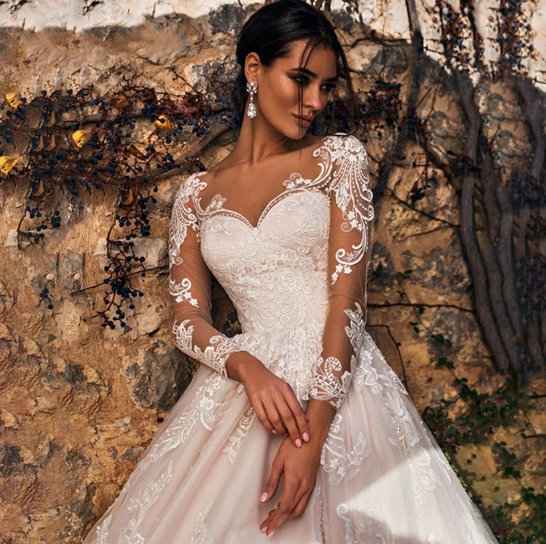Romantic Long Sleeve Sheer Scroll Sweetheart Neckline Embroidered Princess A-Line Wedding Gown