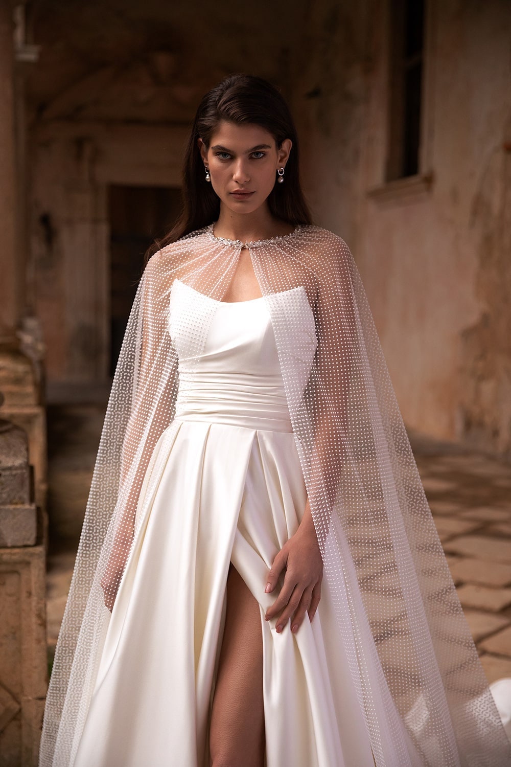 Satin Strapless Pointed Pleated Corset A-Line Gown With High Split Hem And Dotted Tulle Cape