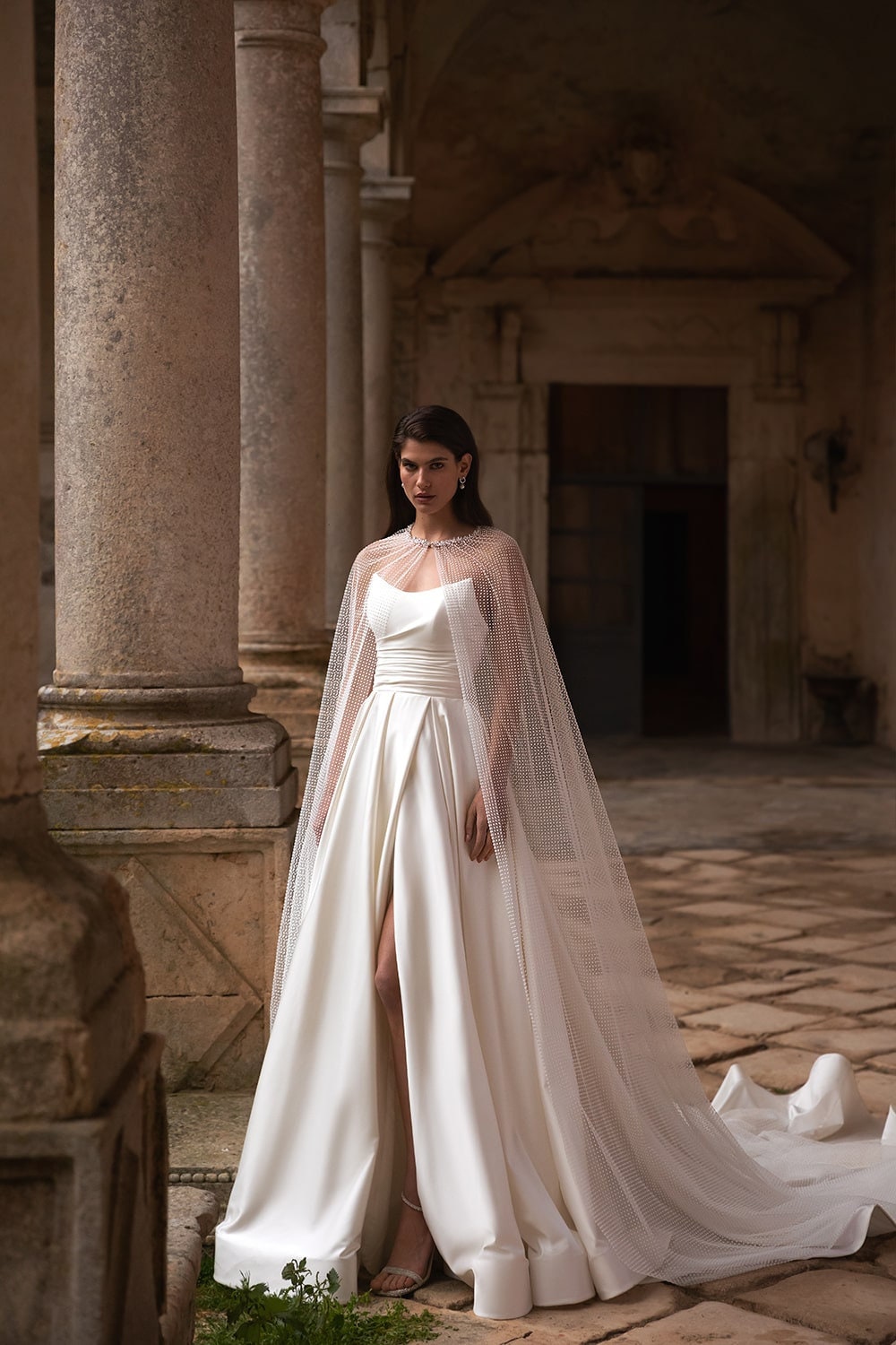 Satin Strapless Pointed Pleated Corset A-Line Gown With High Split Hem And Dotted Tulle Cape