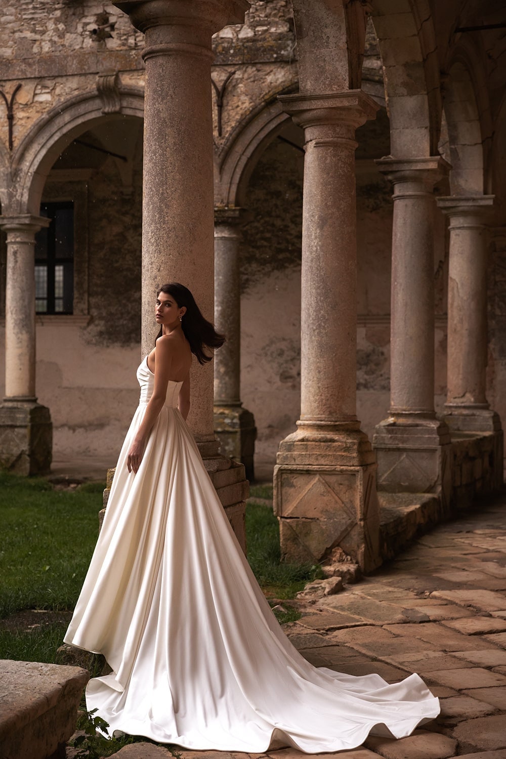 Satin Strapless Pointed Pleated Corset A-Line Gown With High Split Hem And Dotted Tulle Cape