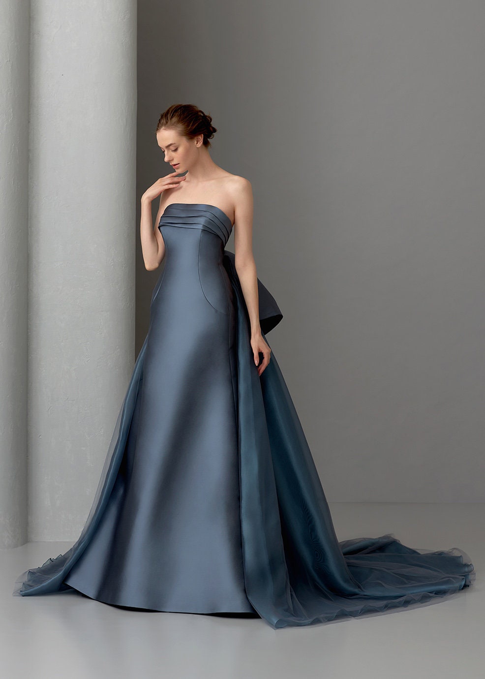 Pleated And Layered Folded Boat Neck Strapless High Waisted A-Line Gown With Detachable Train