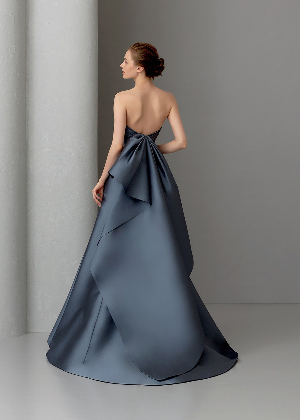 Pleated And Layered Folded Boat Neck Strapless High Waisted A-Line Gown With Detachable Train