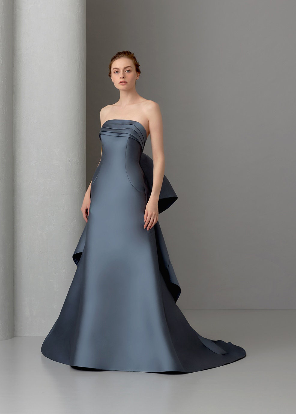 Pleated And Layered Folded Boat Neck Strapless High Waisted A-Line Gown With Detachable Train