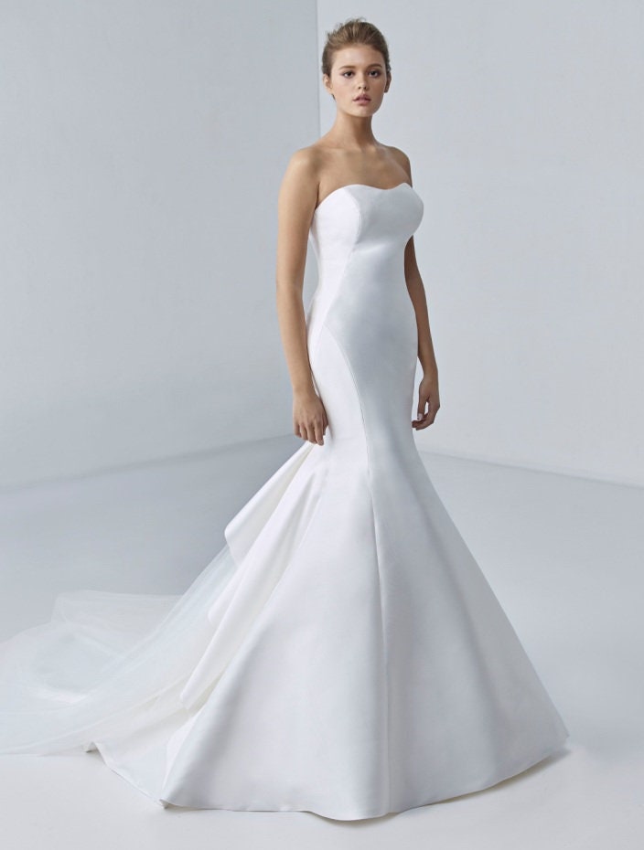Fit & Flare Strapless Sweetheart Empire Waist Minimalist Gown With Pulled Up Back And Layered Train