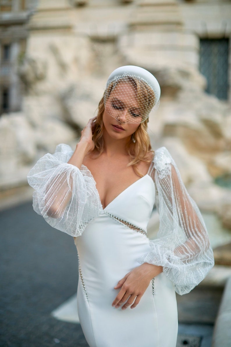Sheer Shimmering Floral Shoulder Detail Long Sleeve Cutout Side Shimmering And Open Back Trumpet Bridal Gown