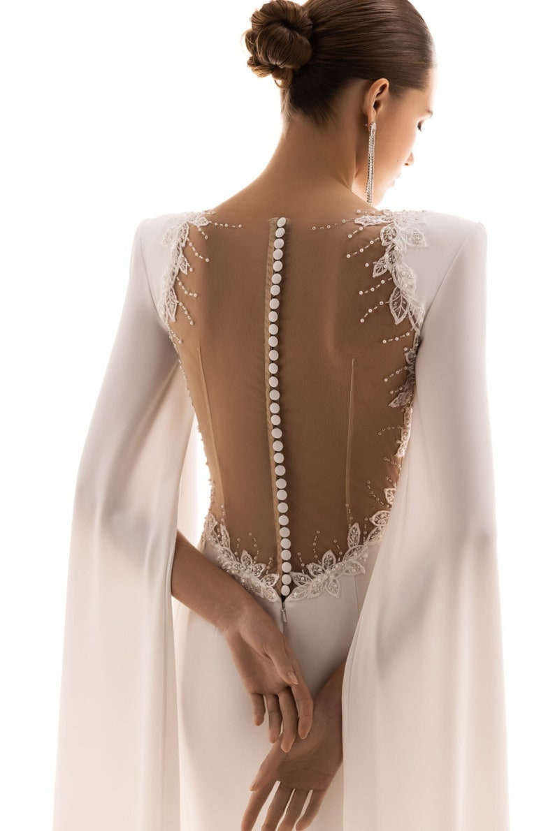 Minimalist 3/4 Split Floor Length Sleeve Illusion Back With Sequin Floral Appliqué Trim And Button Up Enclosure Trumpet Gown