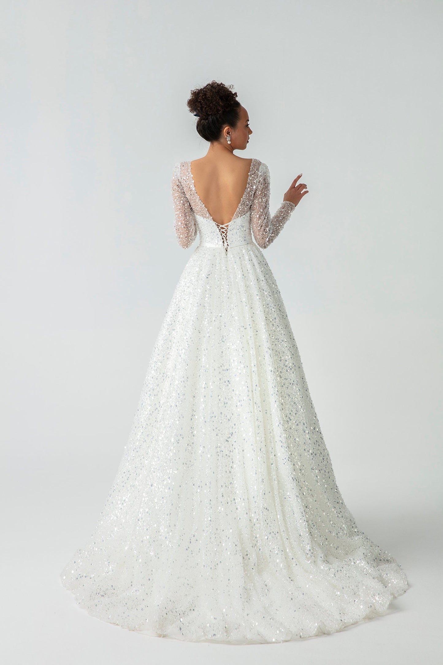 Sparkling Sheer Long Sleeve Sequin Covered Sweetheart A-Line Gown With Open V Back, Bow Knot Sash And Lace Up Enclosure