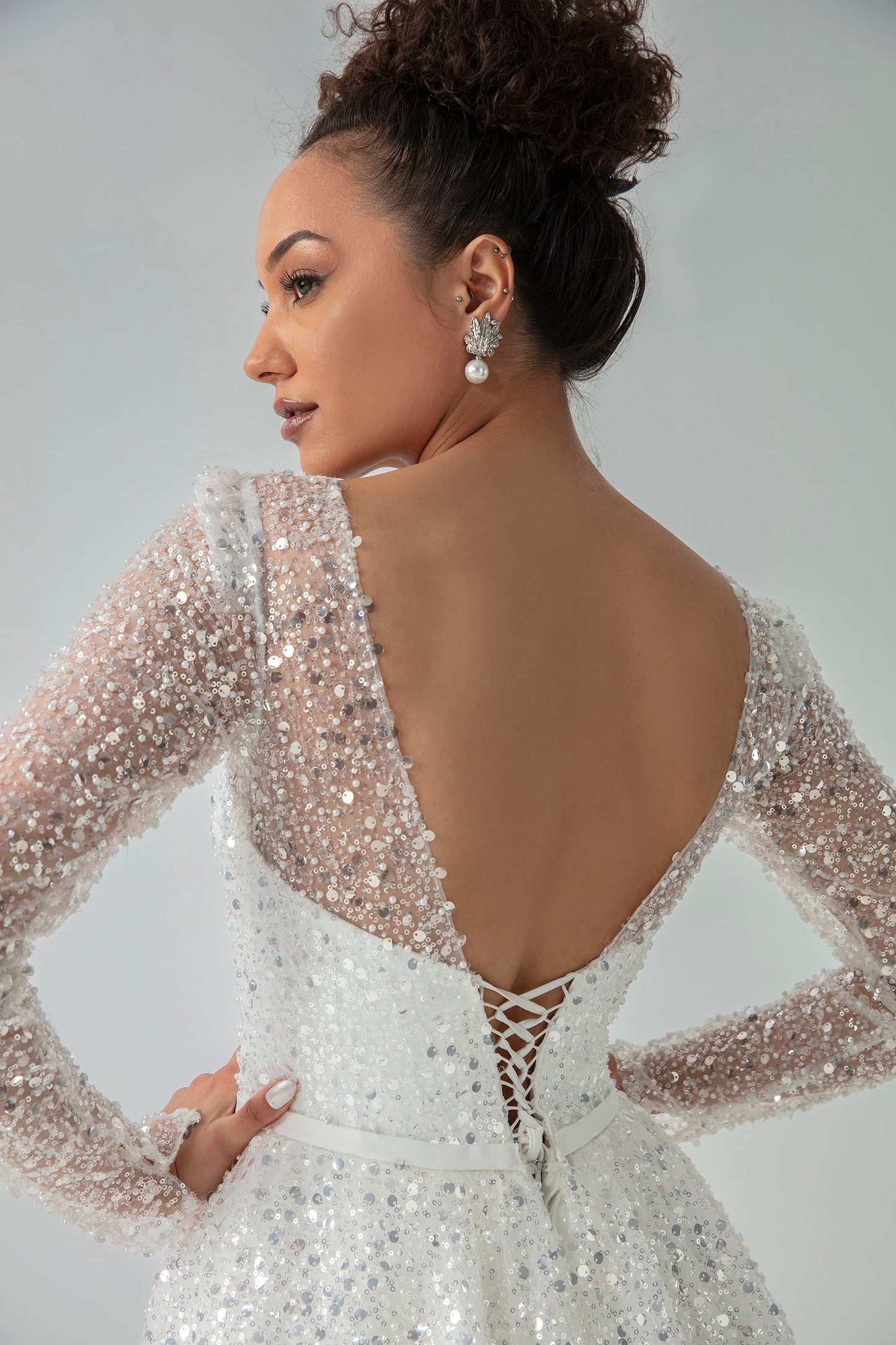 Sparkling Sheer Long Sleeve Sequin Covered Sweetheart A-Line Gown With Open V Back, Bow Knot Sash And Lace Up Enclosure