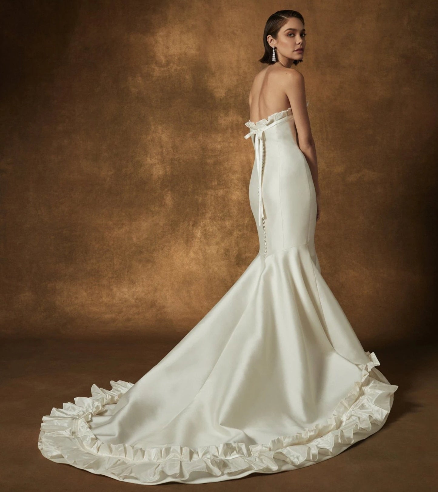 Strapless Mikado Ivory Ruffled Half Scoop Neckline Pleated Minimalist Mermaid Bridal Gown With Ruffled Hem