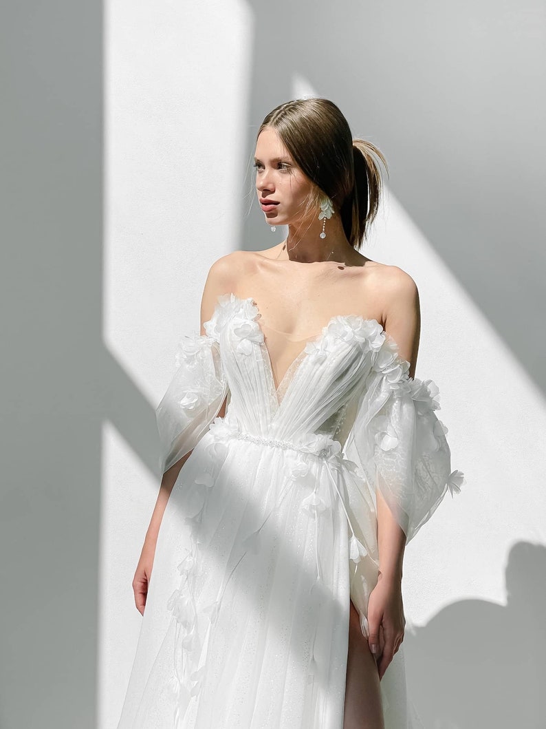 Shimmering Off The Shoulder Plunging Illusion V Neck Floral Embroidered Appliqués Bridal Gown