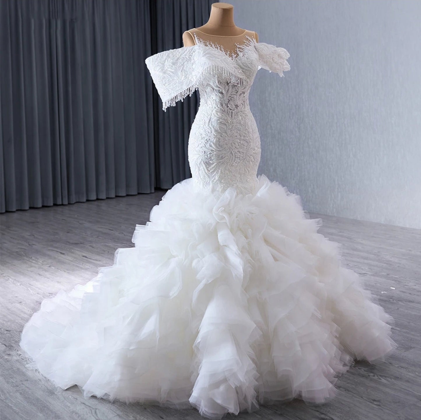 Beaded Floral Lace Off The Shoulder Crystal Beaded Illusion Crystal Beaded Drop Detail Trumpet Gown & Detached Ruffle Layered Hem Train