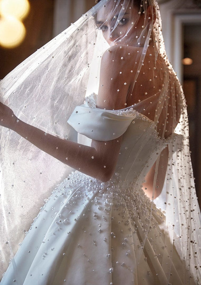 Sweeping Satin Off The Shoulder Scattered Pearl Beaded Plunging Sweetheart Neckline Bridal A-Line Ball Gown