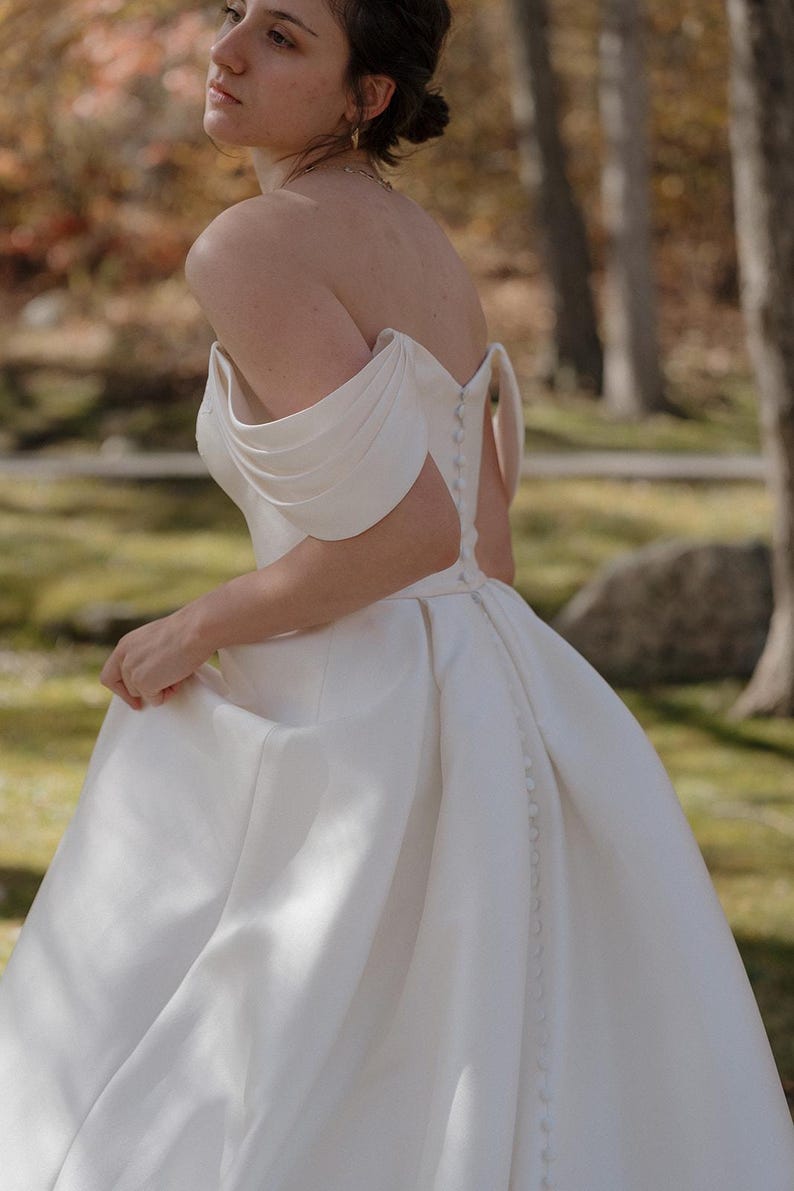 Pleated Off The Shoulder Plunging Sweetheart Floral Appliqué Minimalist A-Line Bridal Gown