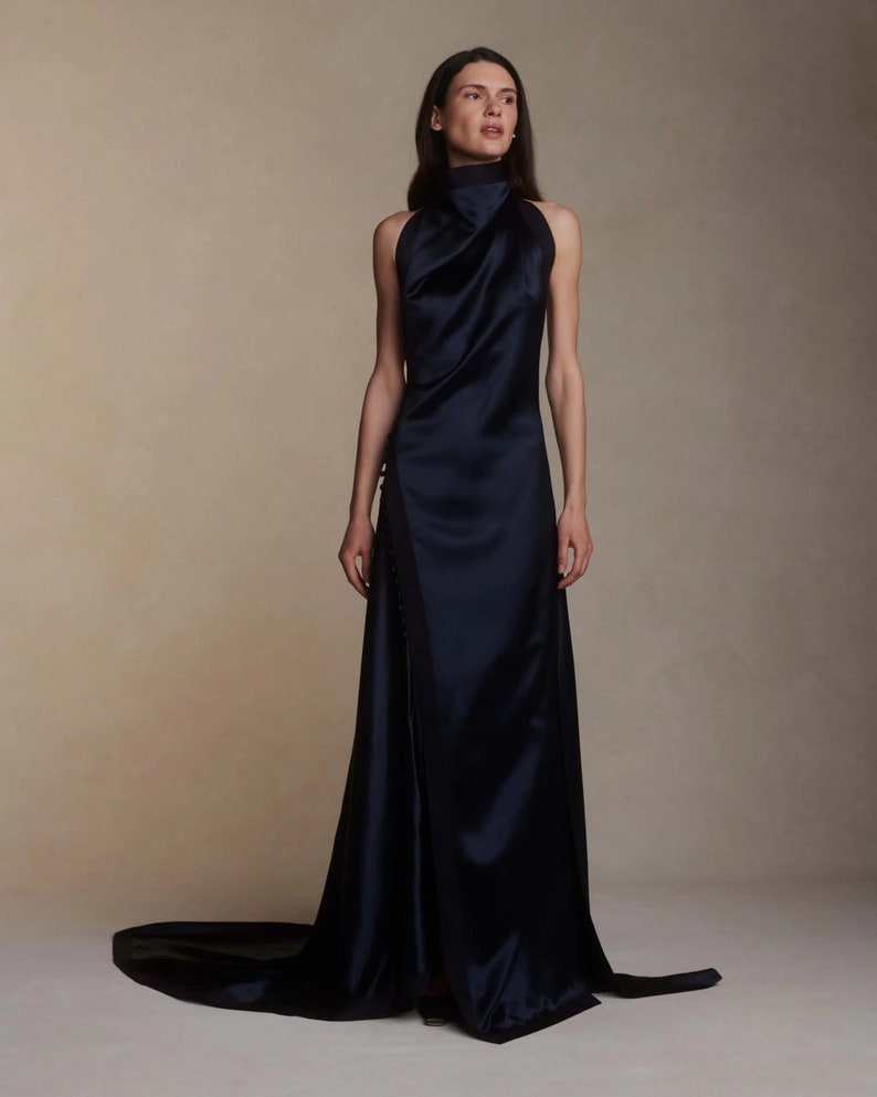 Whimsical Simple & Satin Halter Neck Gown With Side Split Hem With Trailing Buttons