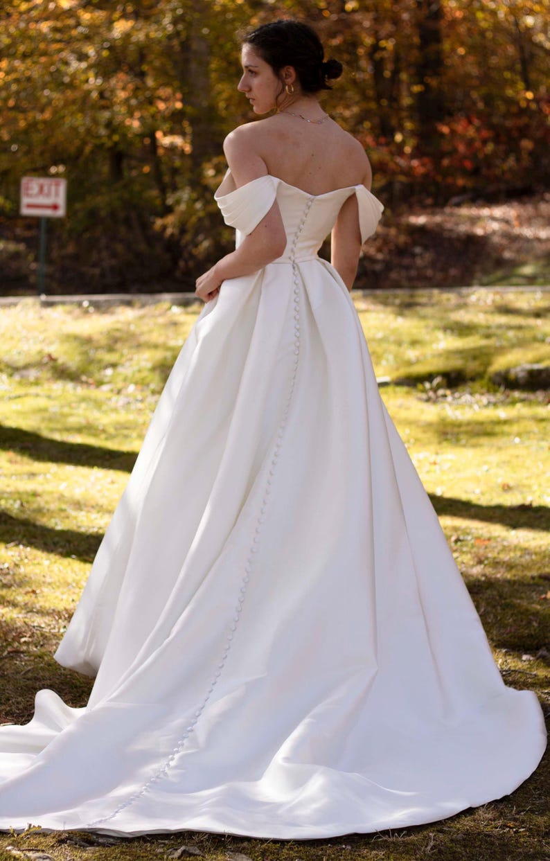 Pleated Off The Shoulder Plunging Sweetheart Floral Appliqué Minimalist A-Line Bridal Gown