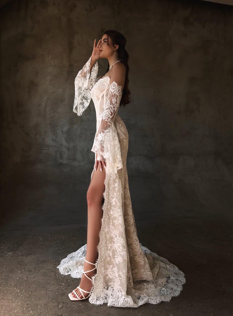 Breathtaking Scattered Floral Lace Corset Inspired Boho Themed Trumpet Bridal Gown With Matching Detached Flare Sleeves