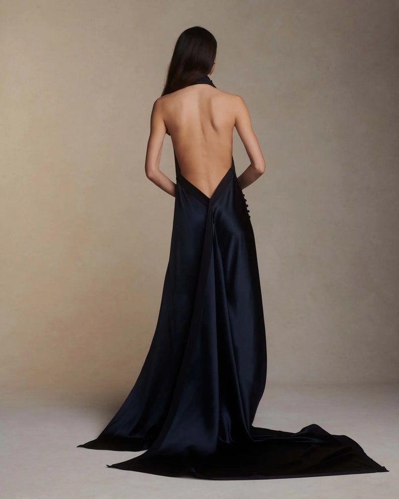 Whimsical Simple & Satin Halter Neck Gown With Side Split Hem With Trailing Buttons
