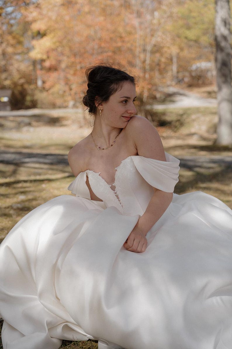 Pleated Off The Shoulder Plunging Sweetheart Floral Appliqué Minimalist A-Line Bridal Gown