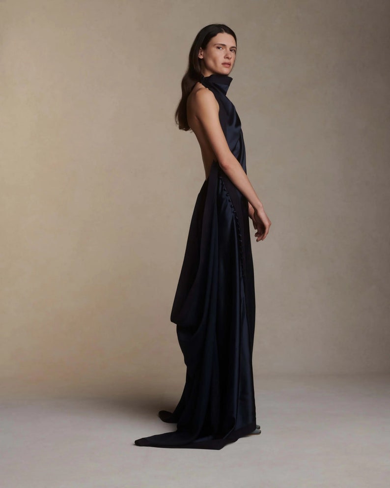 Whimsical Simple & Satin Halter Neck Gown With Side Split Hem With Trailing Buttons