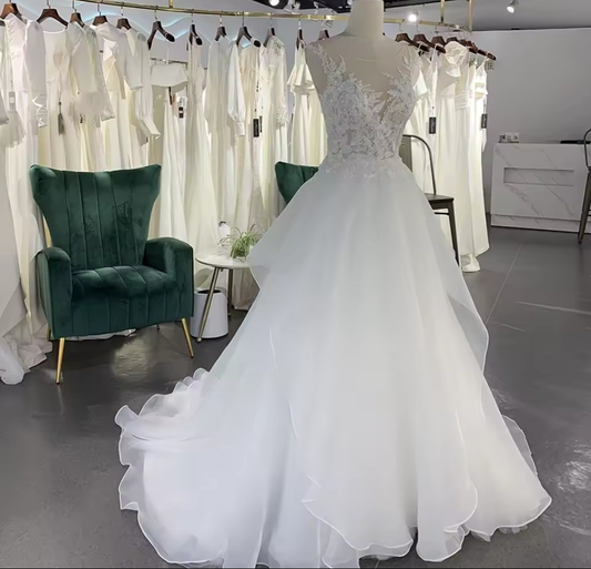 Sleeveless Floral Illusion V Neck Layered Flowing Elegant A-Line Bridal And Ceremonial Gown