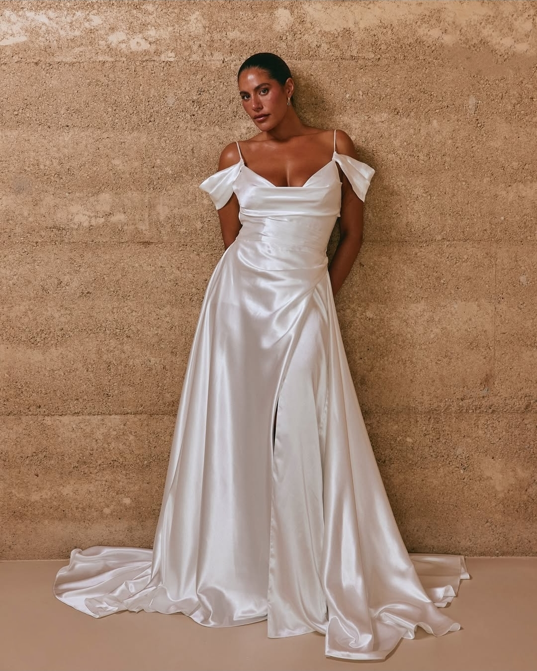 Simply Flawless And Flattering Satin Off The Shoulder Asymmetric Pleated Waist Gown With Split Hem