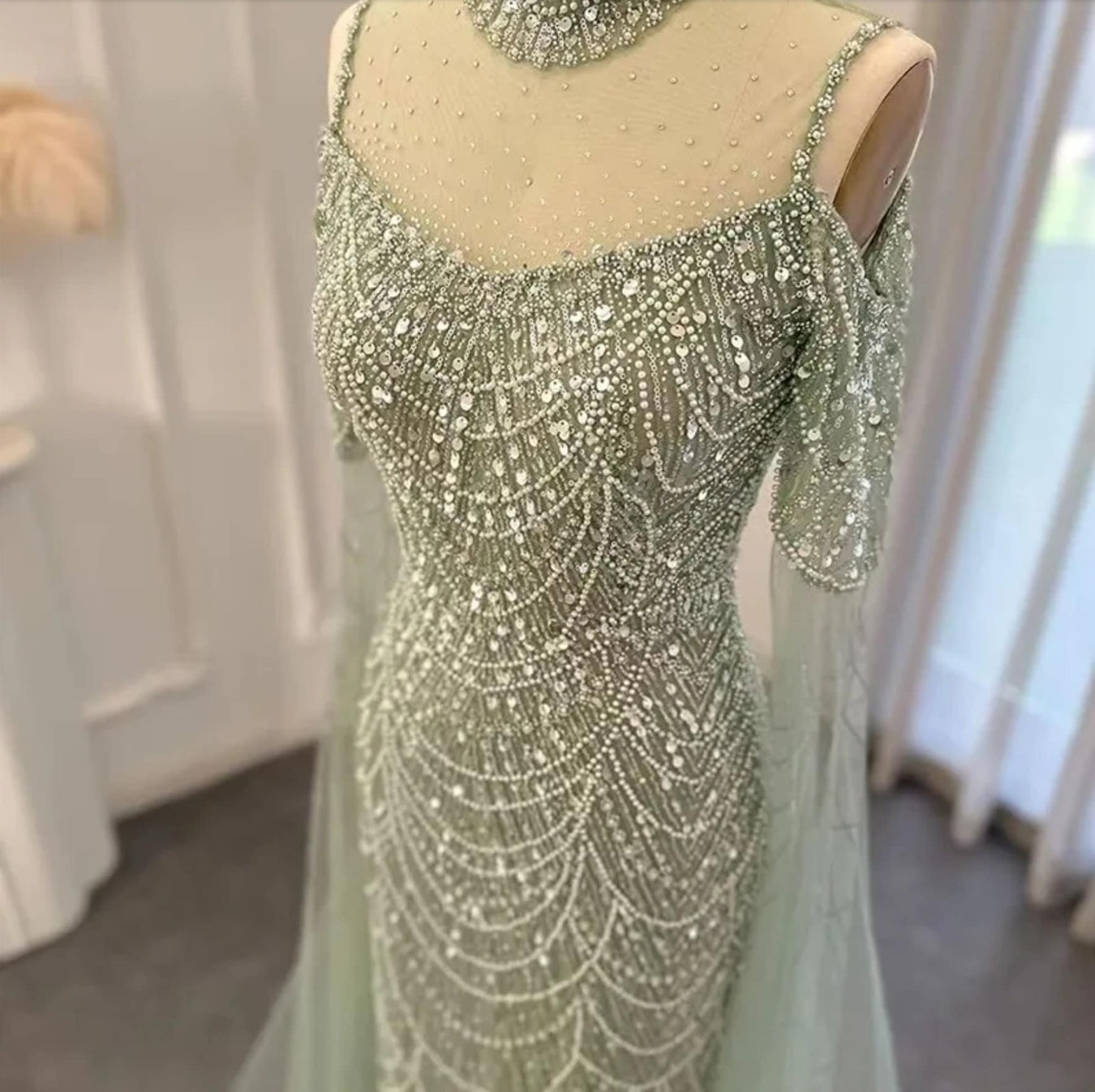 Beaded Sequin Sheer Sweetheart Neckline Mermaid Gown With Dramatic Trailing Floor Length Sleeves