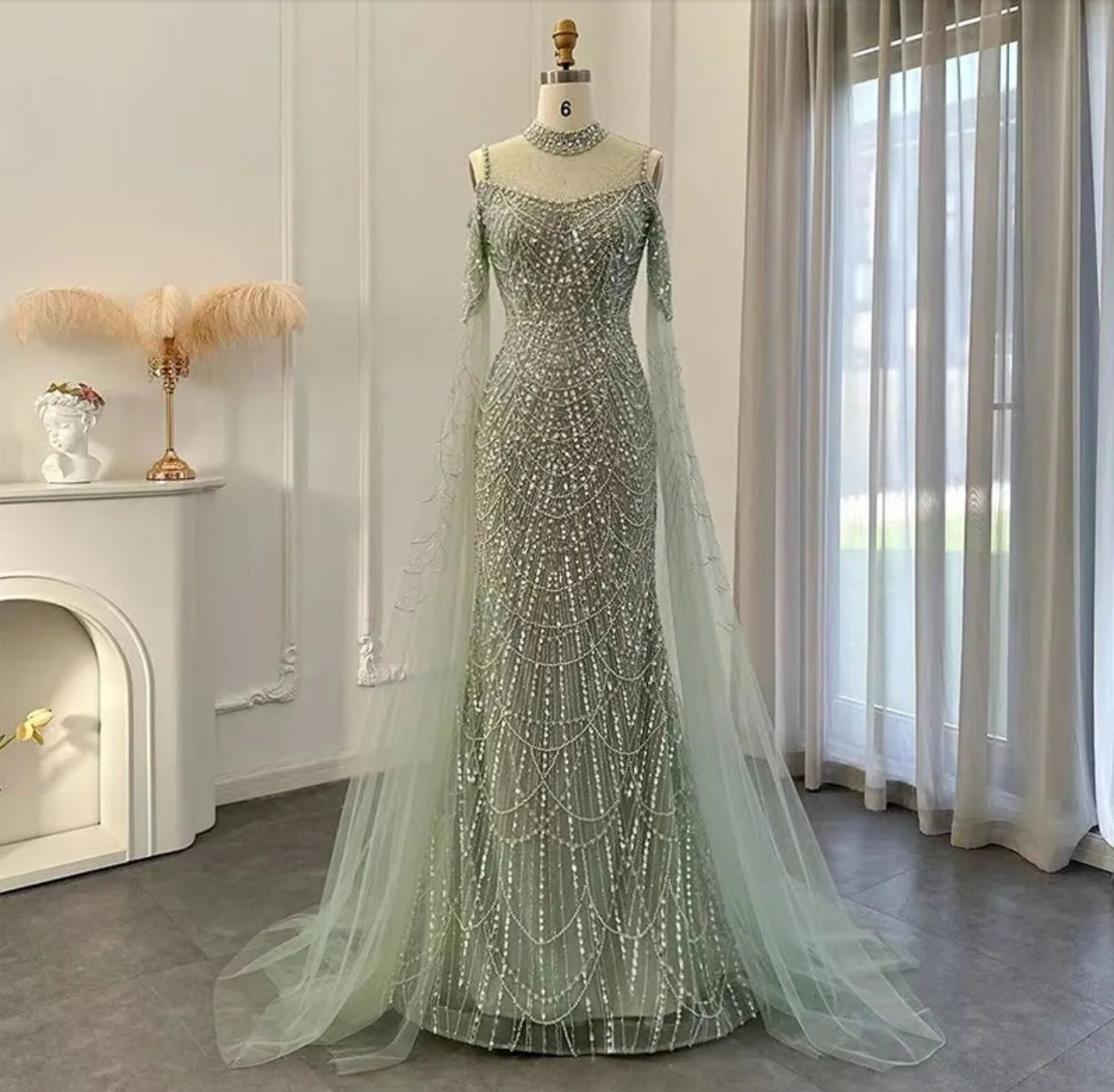 Beaded Sequin Sheer Sweetheart Neckline Mermaid Gown With Dramatic Trailing Floor Length Sleeves