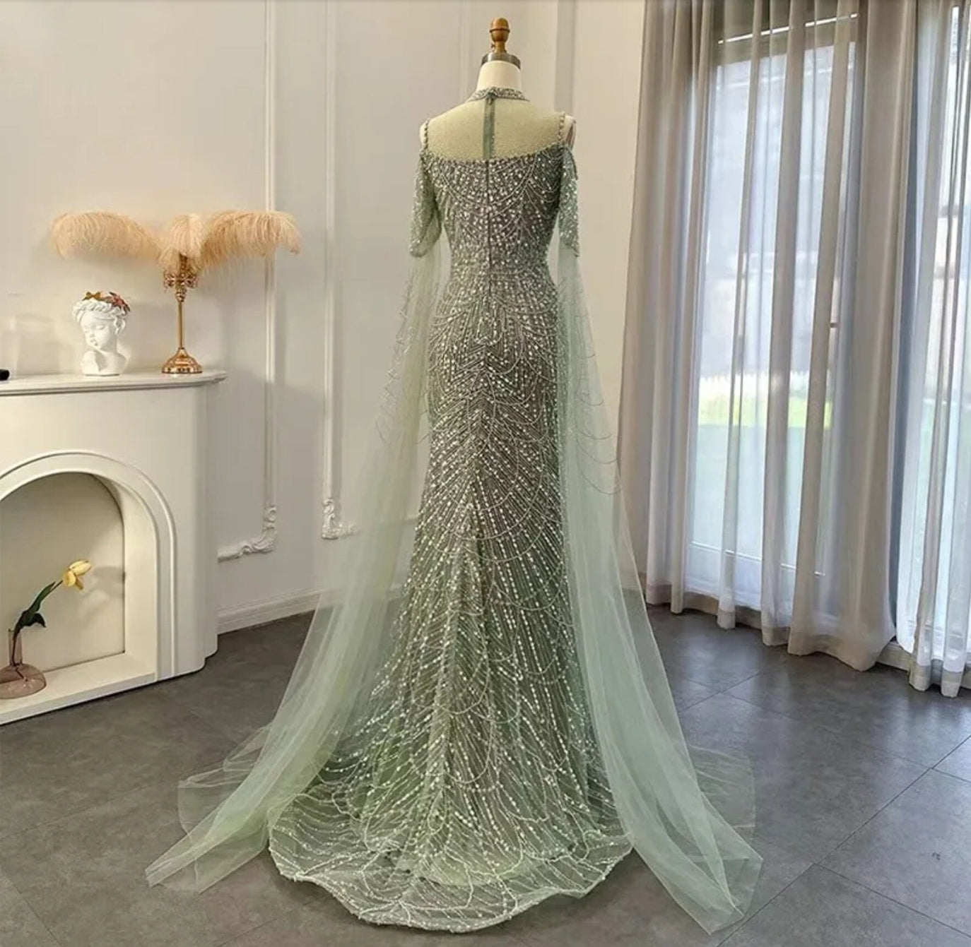 Beaded Sequin Sheer Sweetheart Neckline Mermaid Gown With Dramatic Trailing Floor Length Sleeves