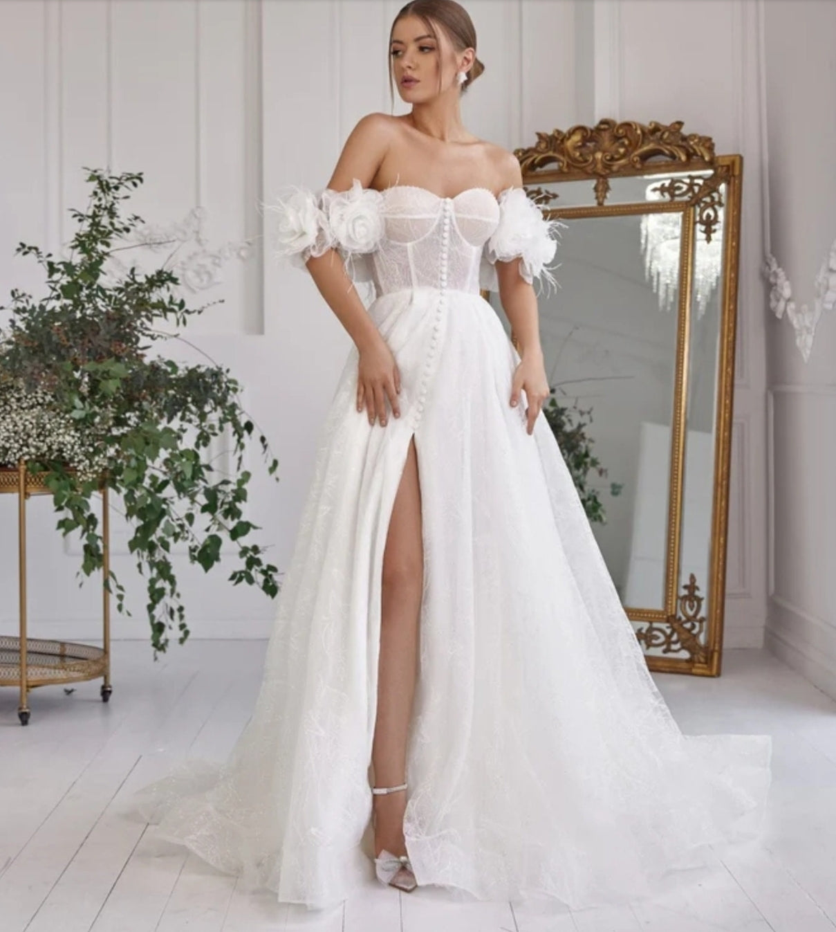 Beautiful Sweetheart Shimmer Corset Style Gown With Oversized Flower Sleeves