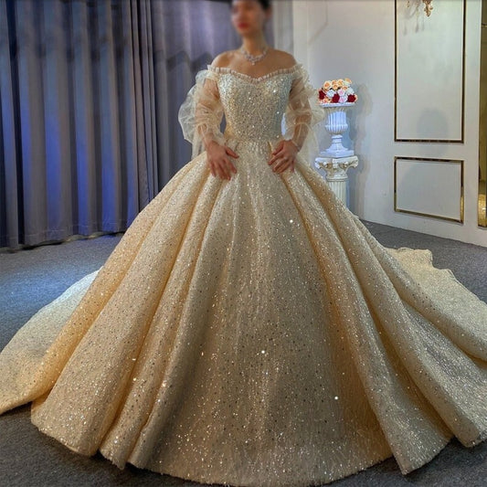 Shimmering Tulle Trimmed Sweetheart Sheer Full Sleeve Wedding Ball Gown