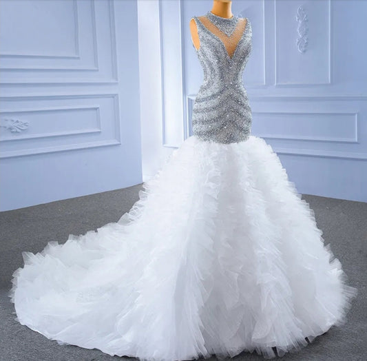 Exquisitely Hand Beaded Sleeveless Illusion High Neck Fit To Flare Layered Ruffle Fishtail Gown