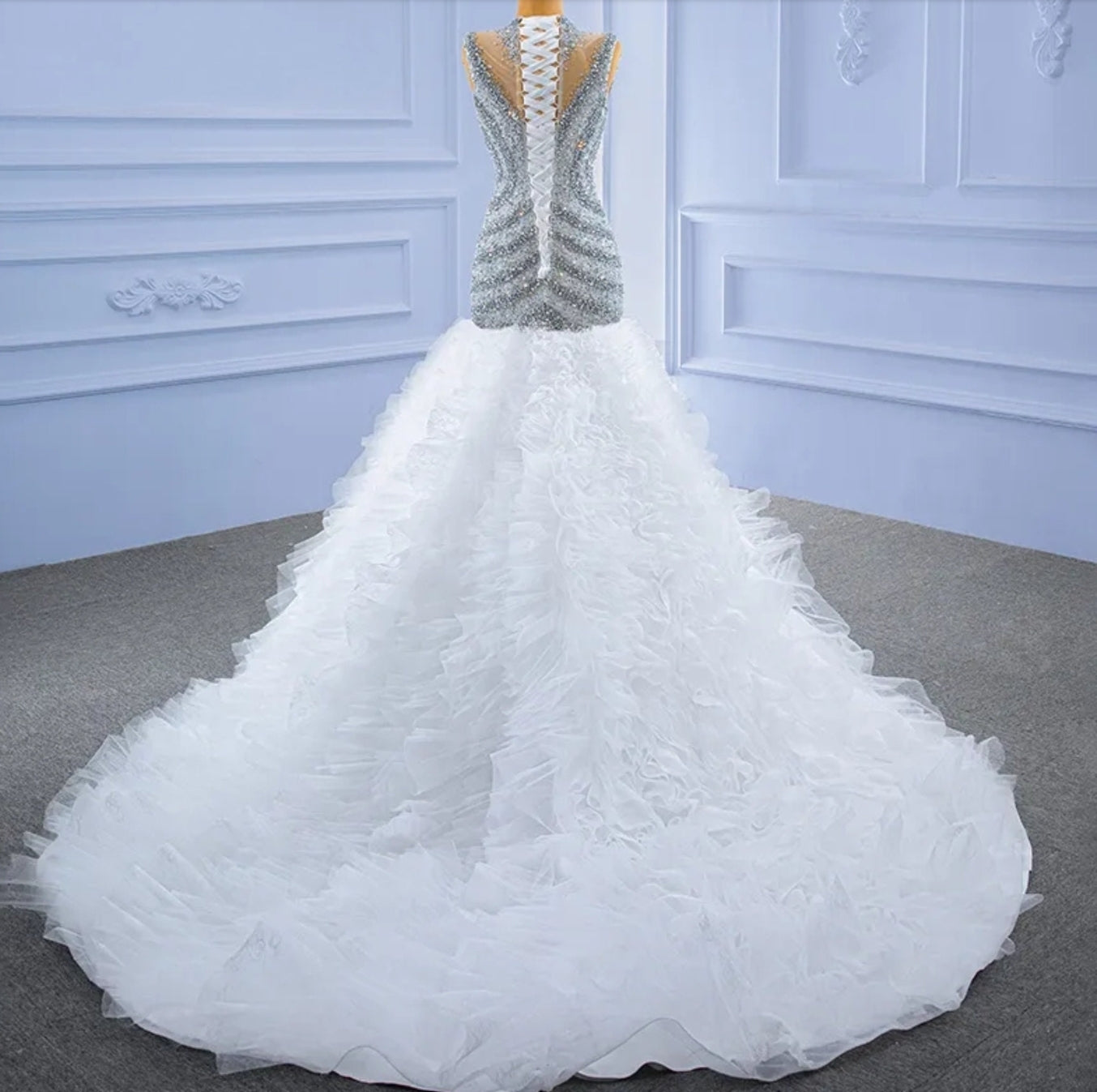 Exquisitely Hand Beaded Sleeveless Illusion High Neck Fit To Flare Layered Ruffle Fishtail Gown