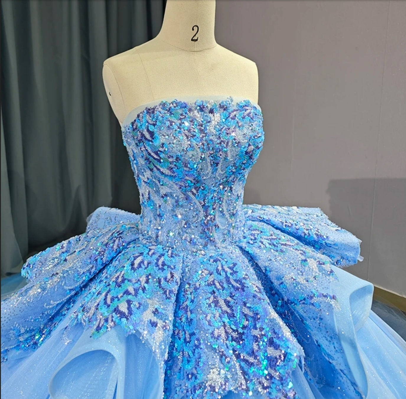 Shimmering Blue Sequin Strapless Boat Neck Layered At The Waistline Quinceañera Special Occasion Bat Mitzvah Sweet Sixteen Pageant Gown