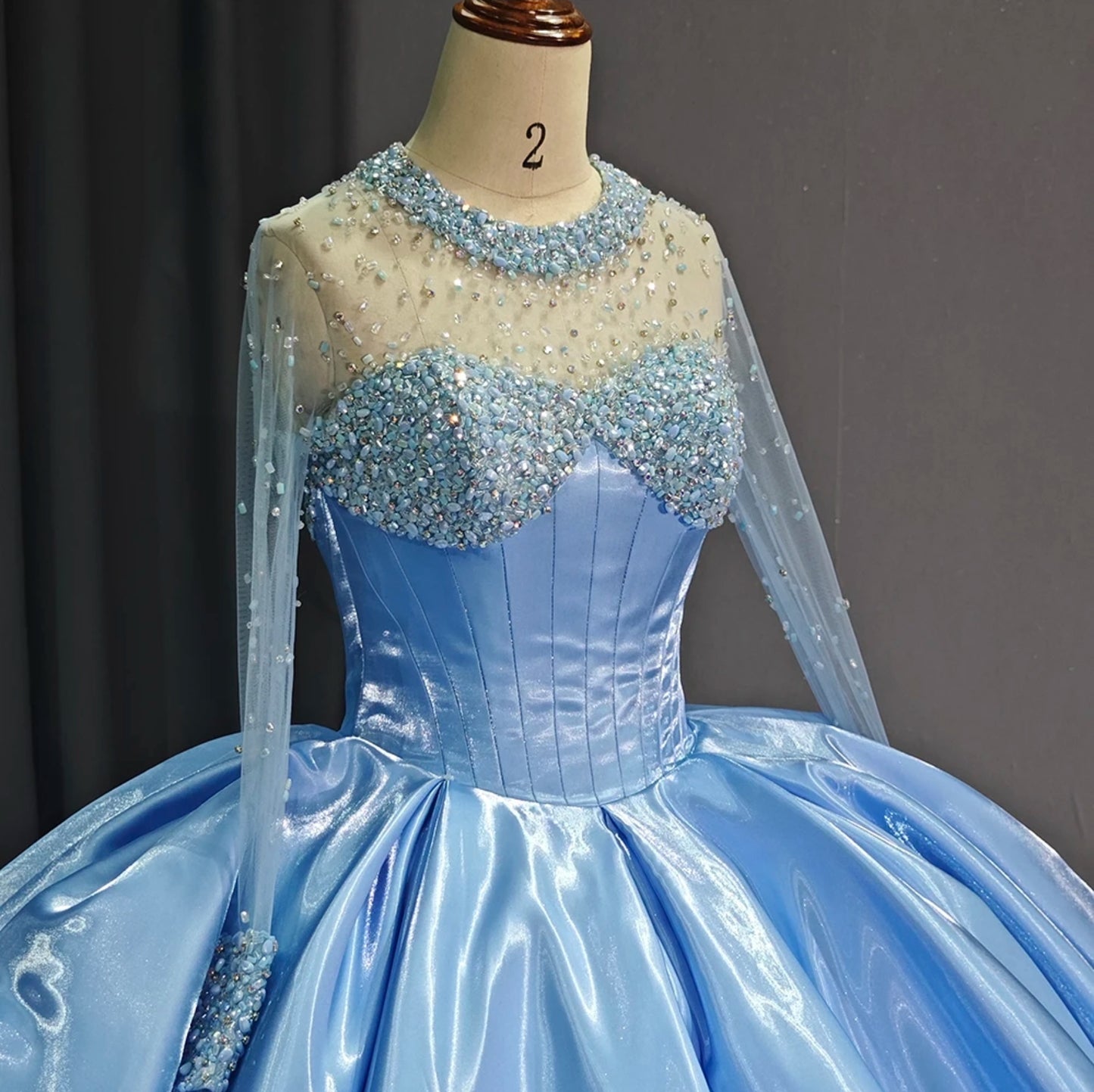 2024 Lovely Blue Crystal Multi Beaded Sheer Illusion Modest Long Sleeve Pleated Bodice Quinceañera, Special Occasion, Sweet 16, Bat Mitzvah, Pageant Ball Gown