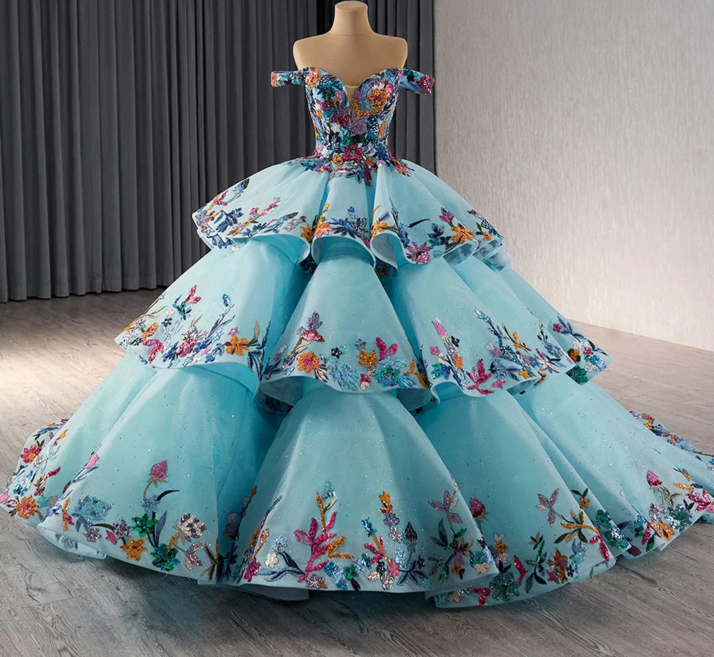 Off The Shoulder Multi Color Floral Sequinned Appliqué Sweetheart Neckline Layered "Cake" Style Blue Quinceañera, Special Occasion, Sweet Sixteen, Pageant, Gala, Formal Ball Gown