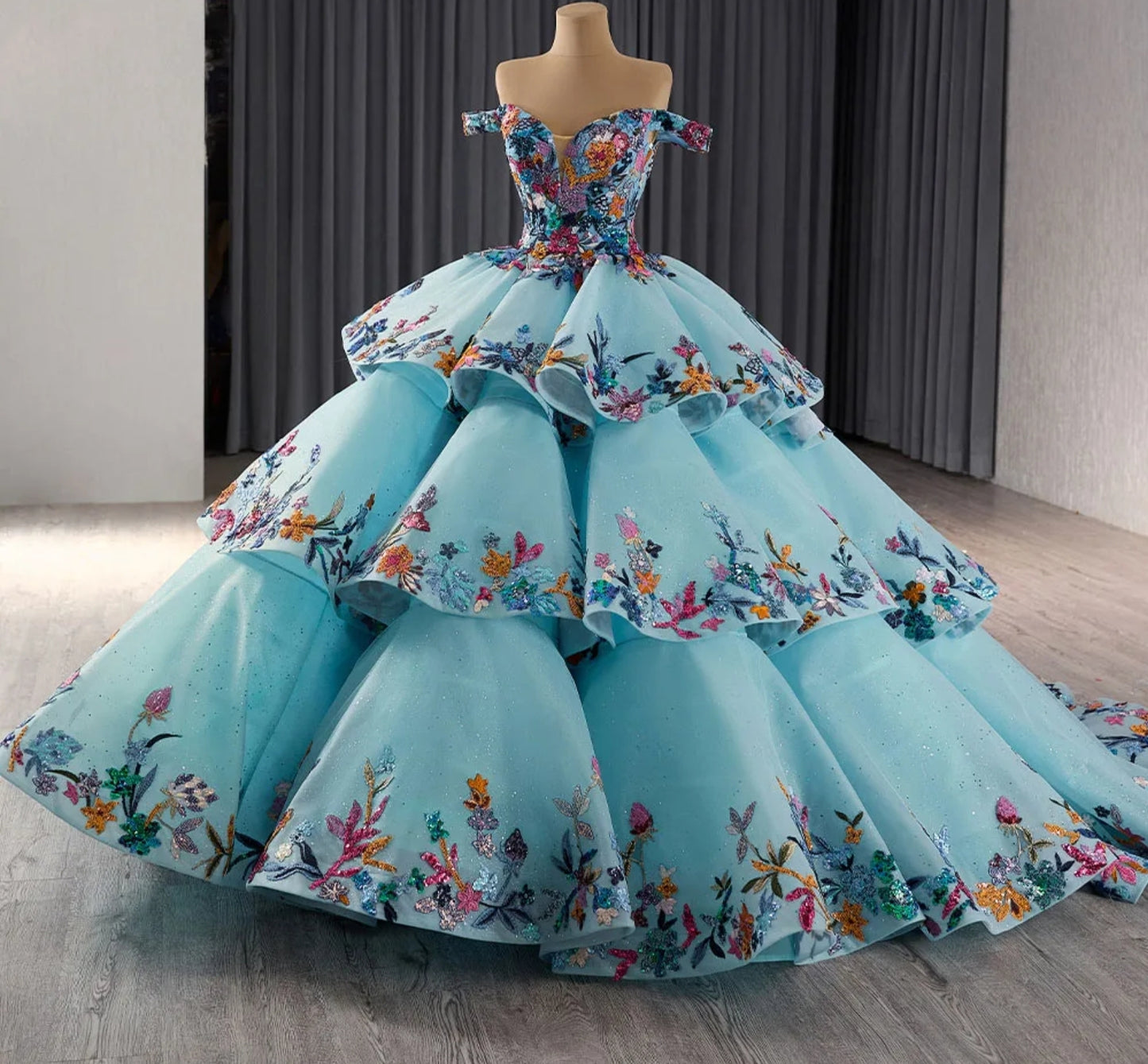 Off The Shoulder Multi Color Floral Sequinned Appliqué Sweetheart Neckline Layered "Cake" Style Blue Quinceañera, Special Occasion, Sweet Sixteen, Pageant, Gala, Formal Ball Gown