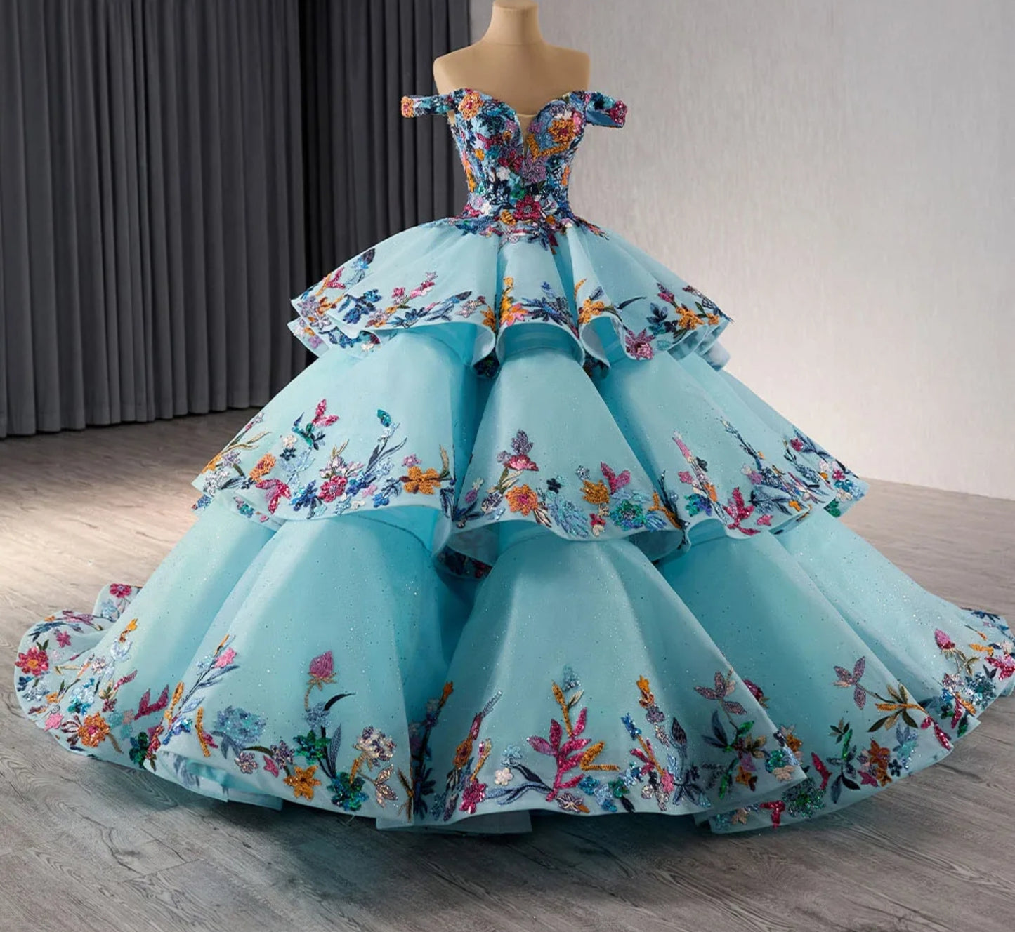 Off The Shoulder Multi Color Floral Sequinned Appliqué Sweetheart Neckline Layered "Cake" Style Blue Quinceañera, Special Occasion, Sweet Sixteen, Pageant, Gala, Formal Ball Gown