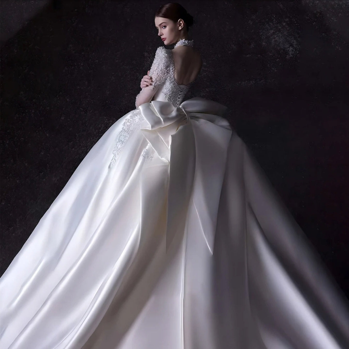 2024 Modern Victorian Sweetheart Satin And Sequin Appliqué Long Sleeve Gown Adorned With Oversized Satin Back Bow Knot