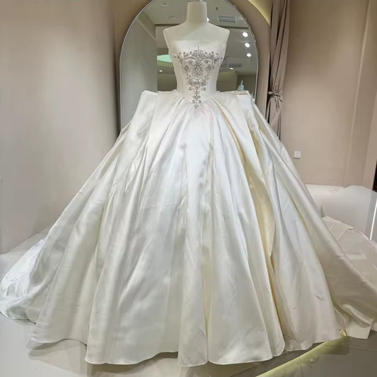 Elegantly Timeless and Simple Strapless Multi Faceted Beading With Sculpted Waist Detail 2025 Bridal And Ceremonial Ball Gown